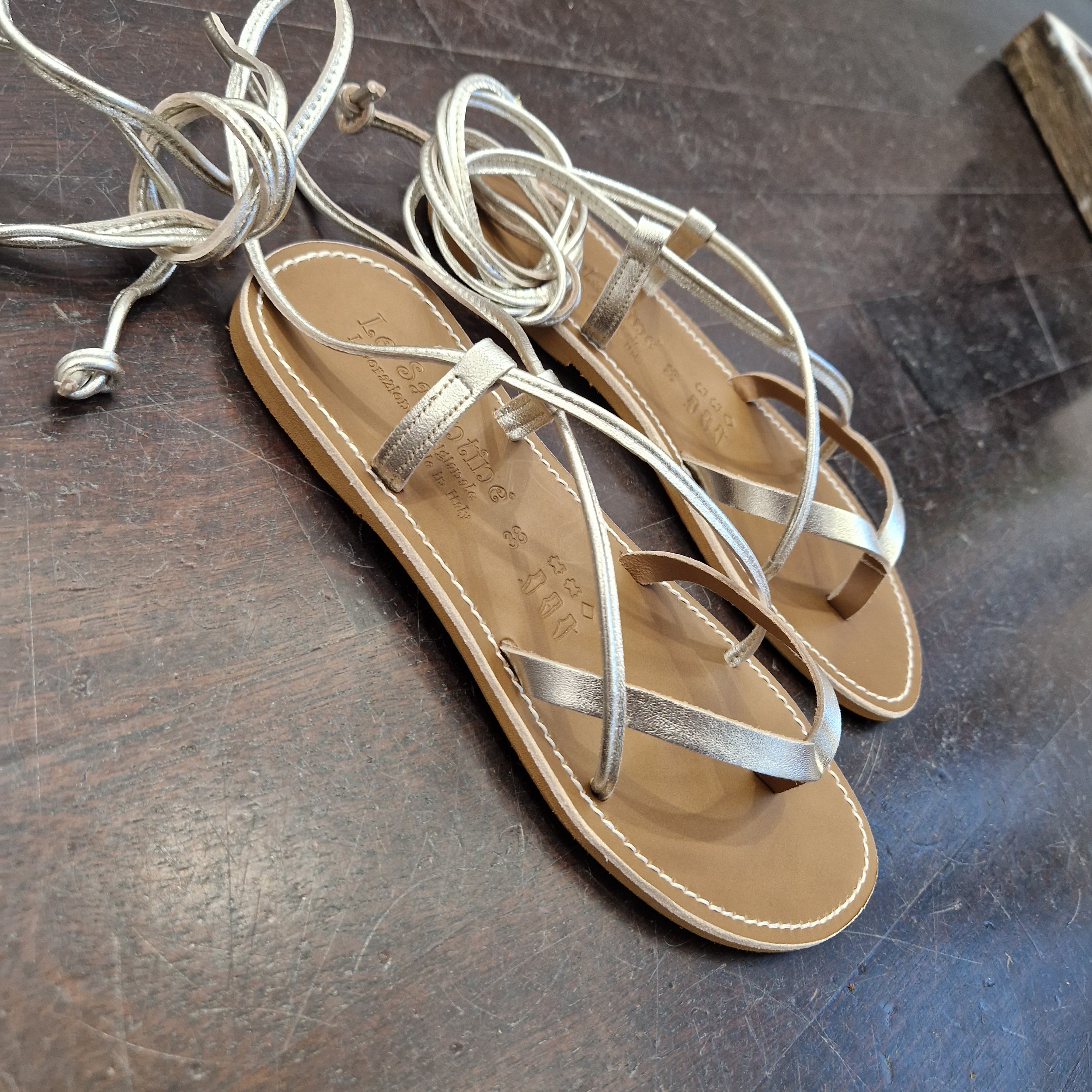 Le Salentine gold platinum flip flop sandal