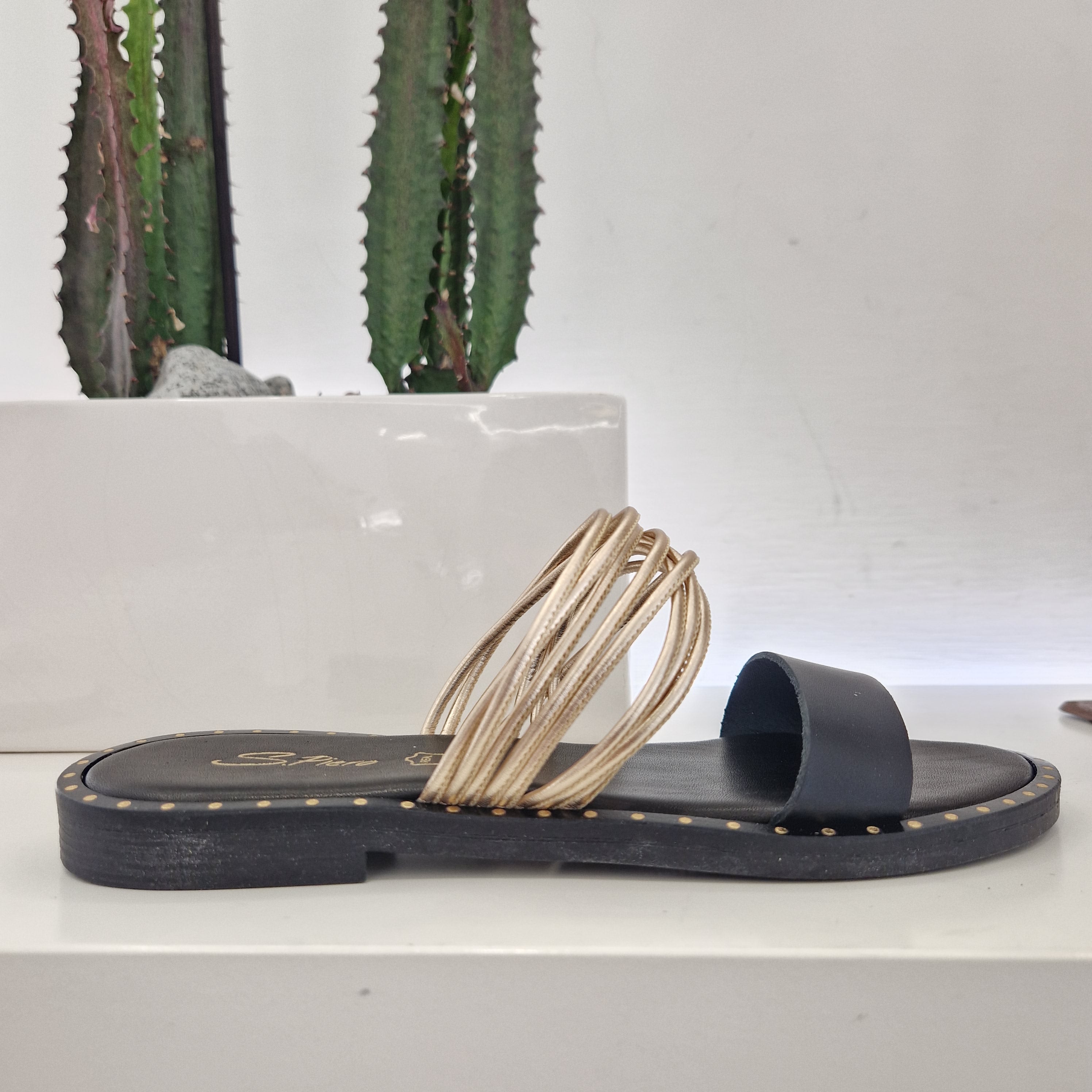 S. Piero black slipper gold straps
