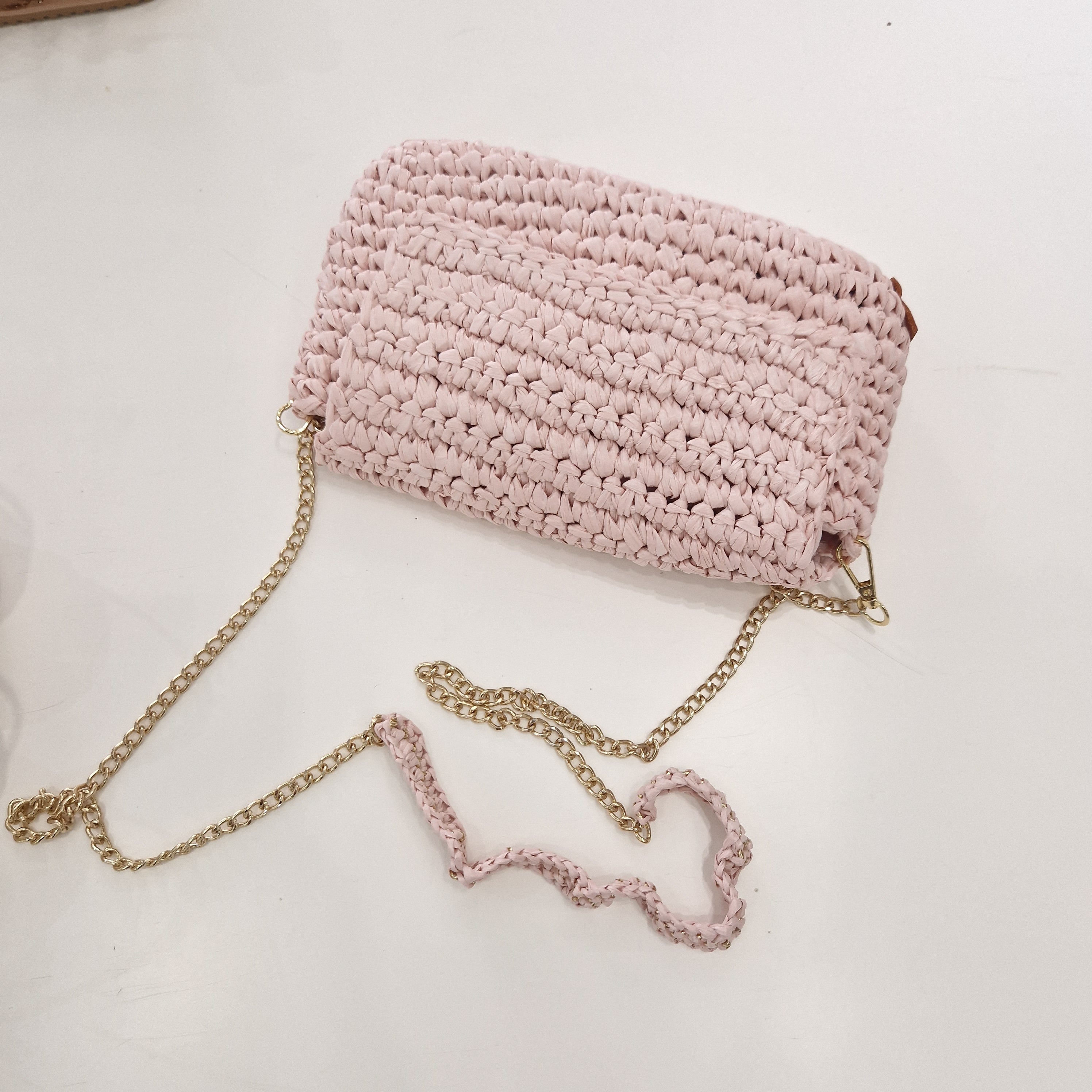 CHICA pochette intrecciata rosa chiaro