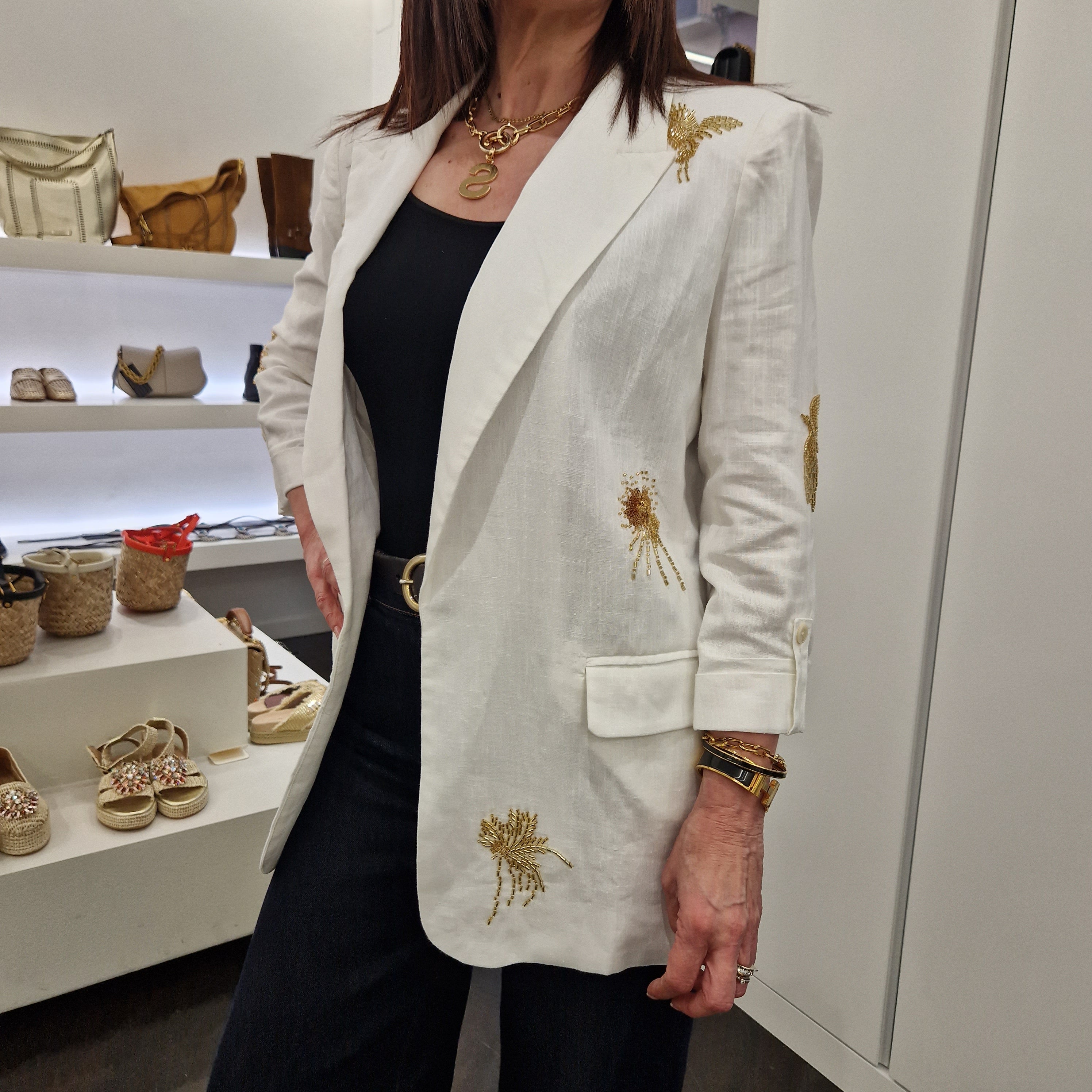 Giacca color panna con paillettes oro