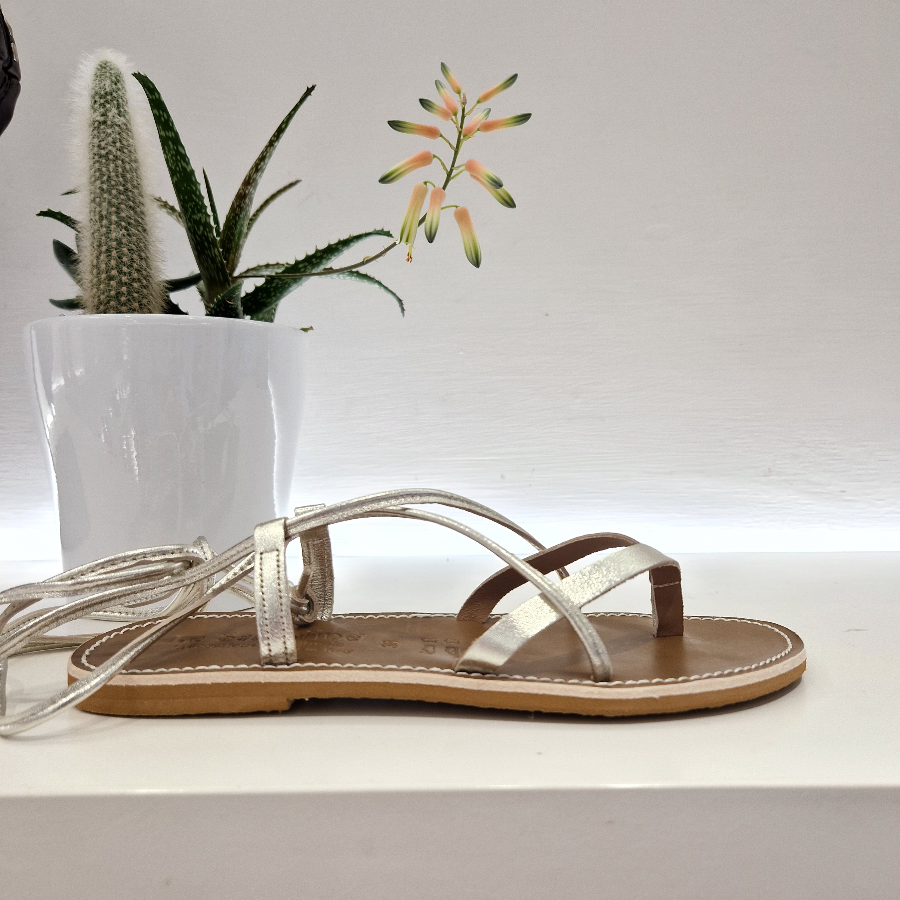 Le Salentine gold platinum flip flop sandal
