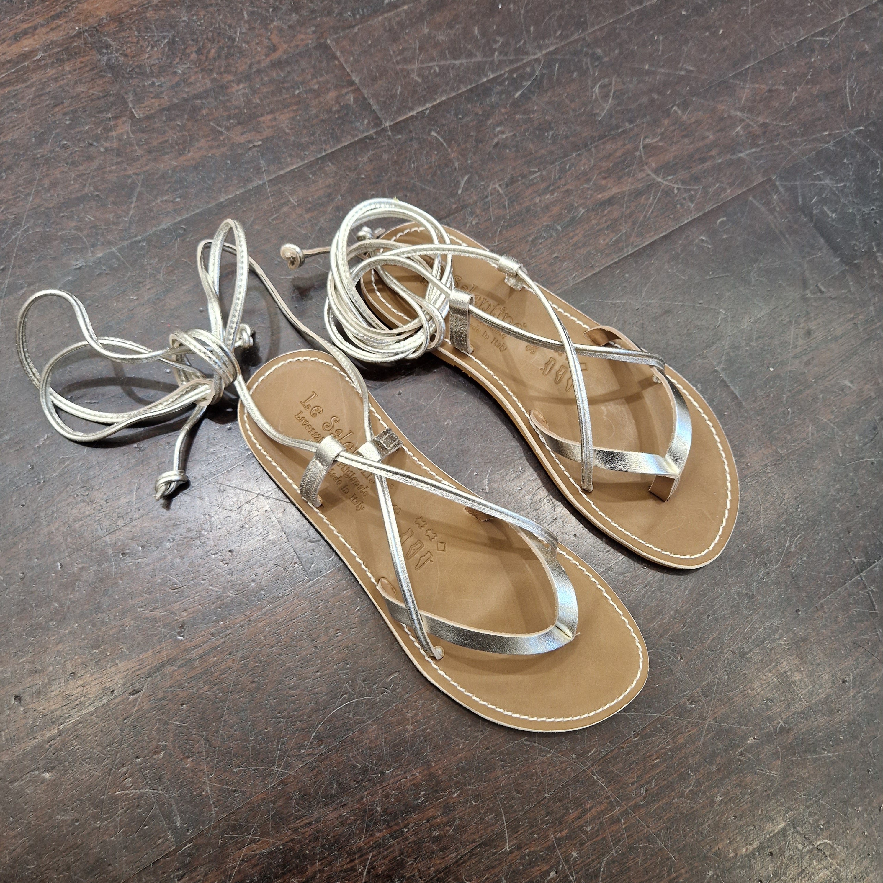 Le Salentine gold platinum flip flop sandal