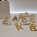 LETTERE ciondolo color oro