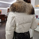 Piumino in pelle con  collo in real fur