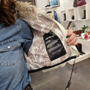 Piumino in pelle con  collo in real fur