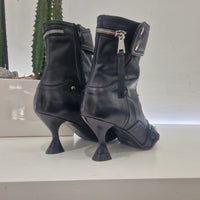 Strategy black ankle boot with zip