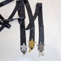 Black tie with rhinestone star