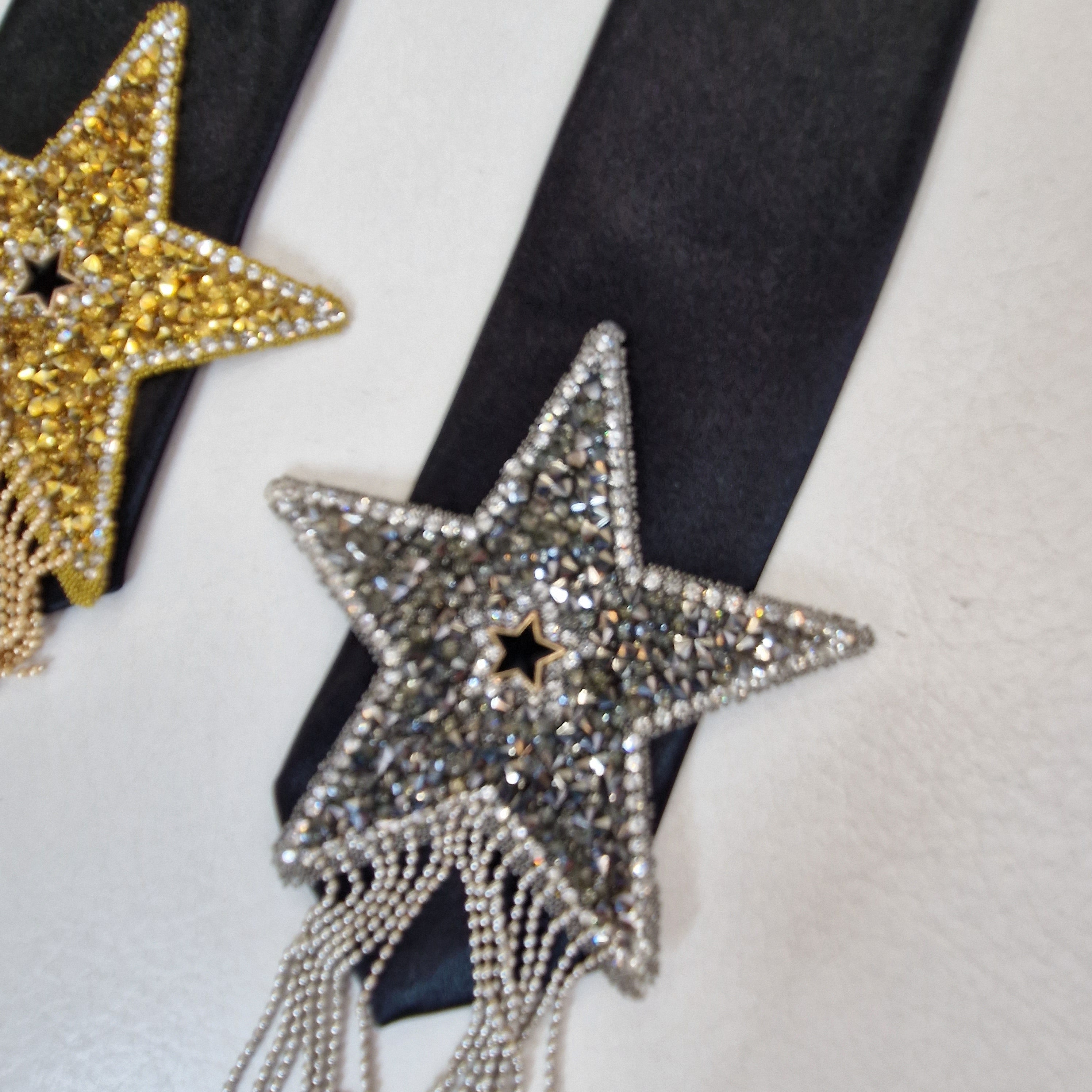 Black tie with rhinestone star