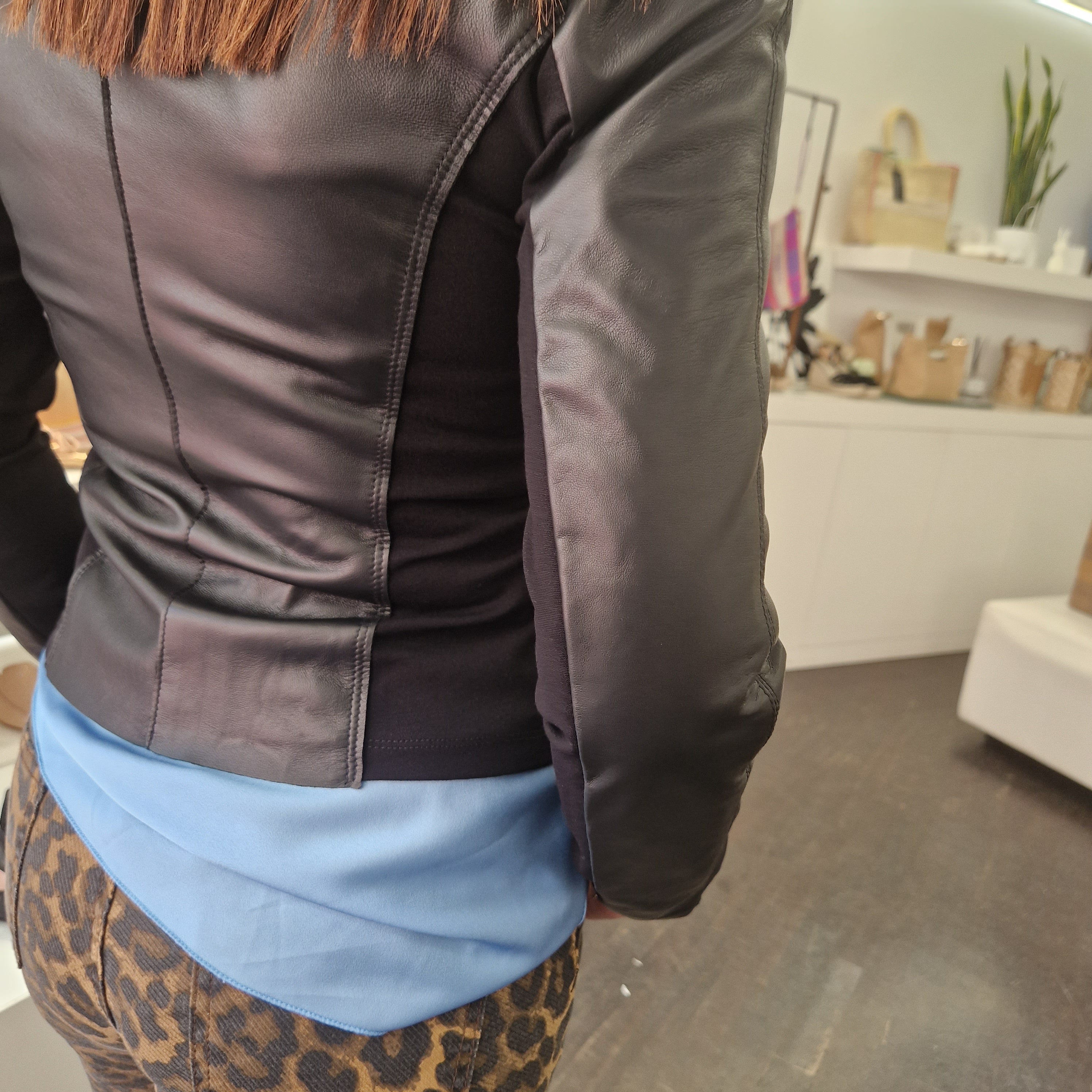 Long jacket in real leather with stretch fabric