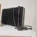 Borsa pochette in metallo  e strass modello ALAIA