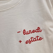 T-shirt bianca scritta rossa