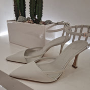 Sergio Levantesi open at the sides cream colored leather
