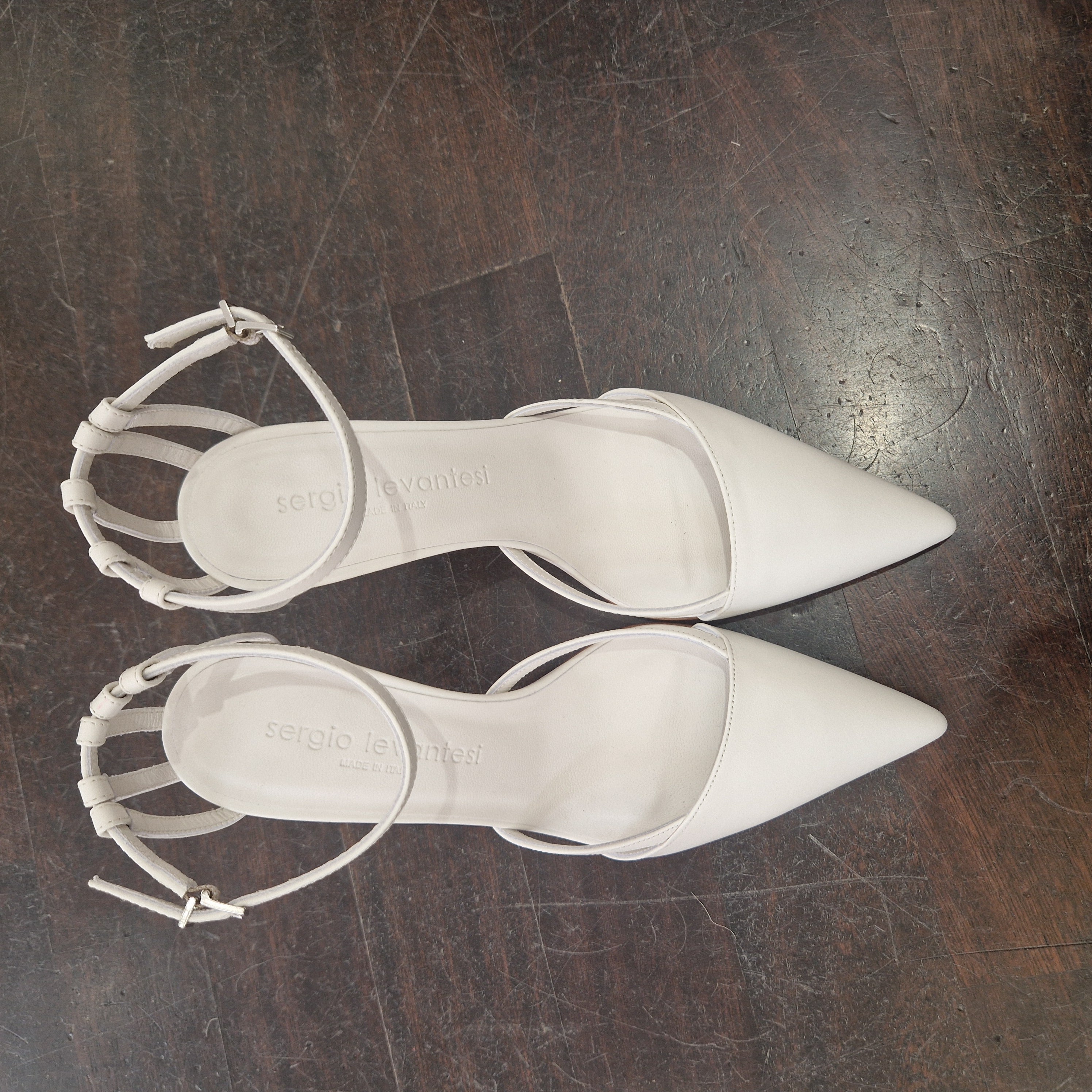 Sergio Levantesi open at the sides cream colored leather