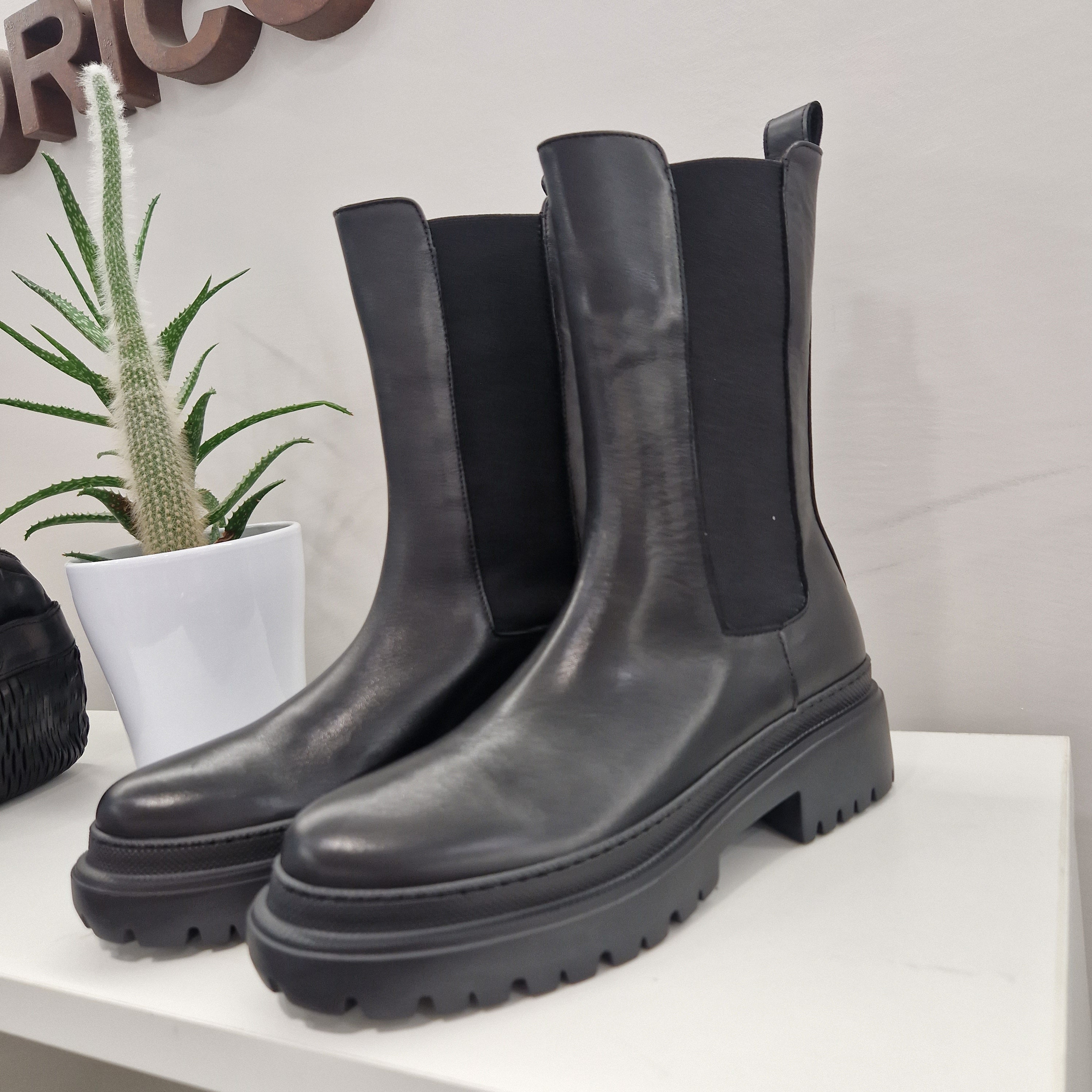 Faire black leather beatles boot