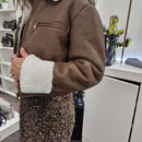 Giacca modello bomber in eco-montone