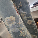 Jeans stampa fiori lavaggio chiaro