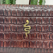 Alberto Luti pochette snake oro
