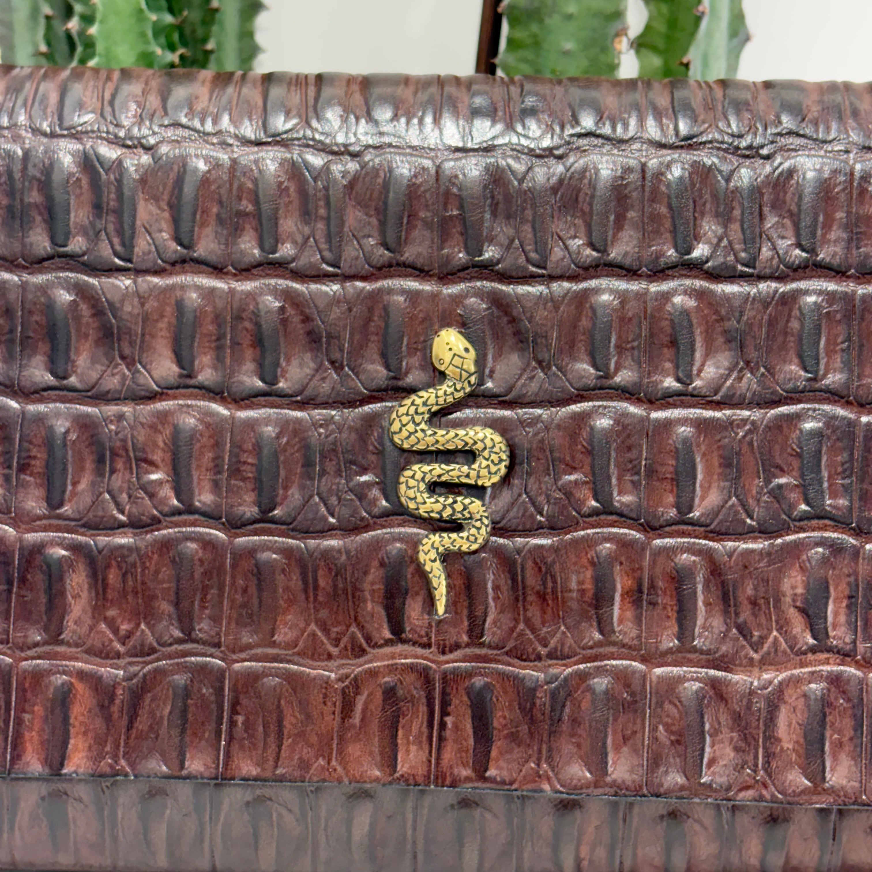 Alberto Luti pochette snake oro