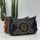 Campomaggi borsa linea TERESA accessorio medaglie e rivetti oro