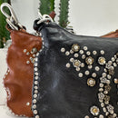 Campomaggi borsa linea TERESA accessorio medaglie e rivetti oro