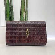 Alberto Luti pochette snake oro