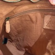 Elena Iachi borsa TEX frange