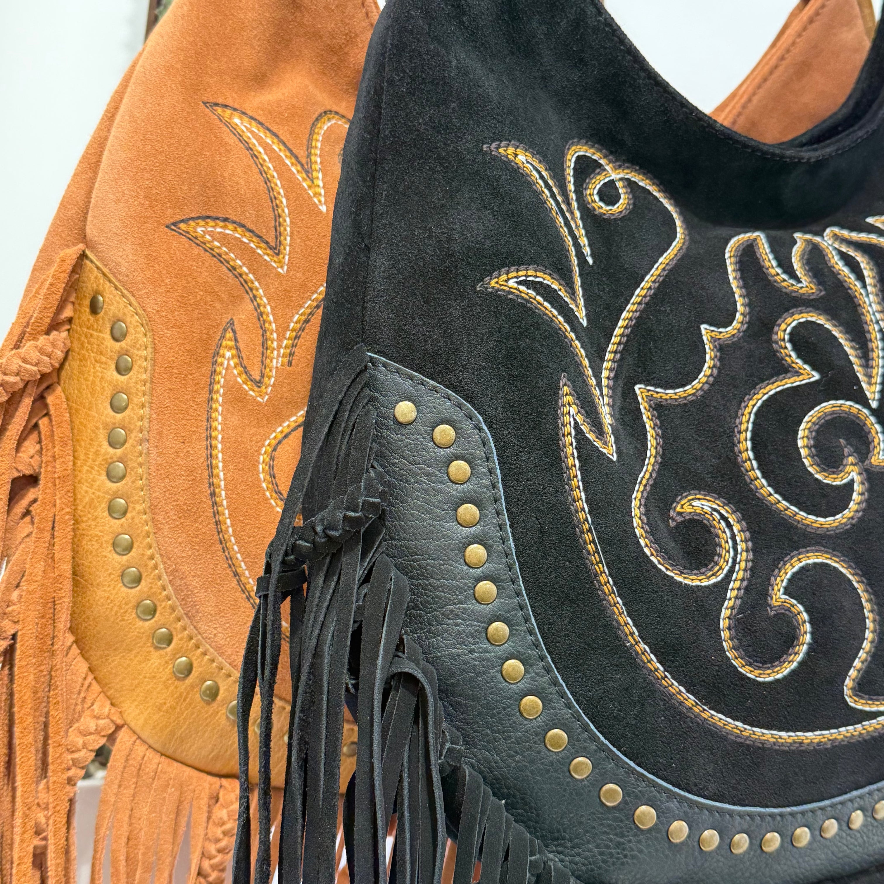 Elena Iachi borsa TEX frange