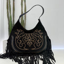 Elena Iachi borsa TEX frange