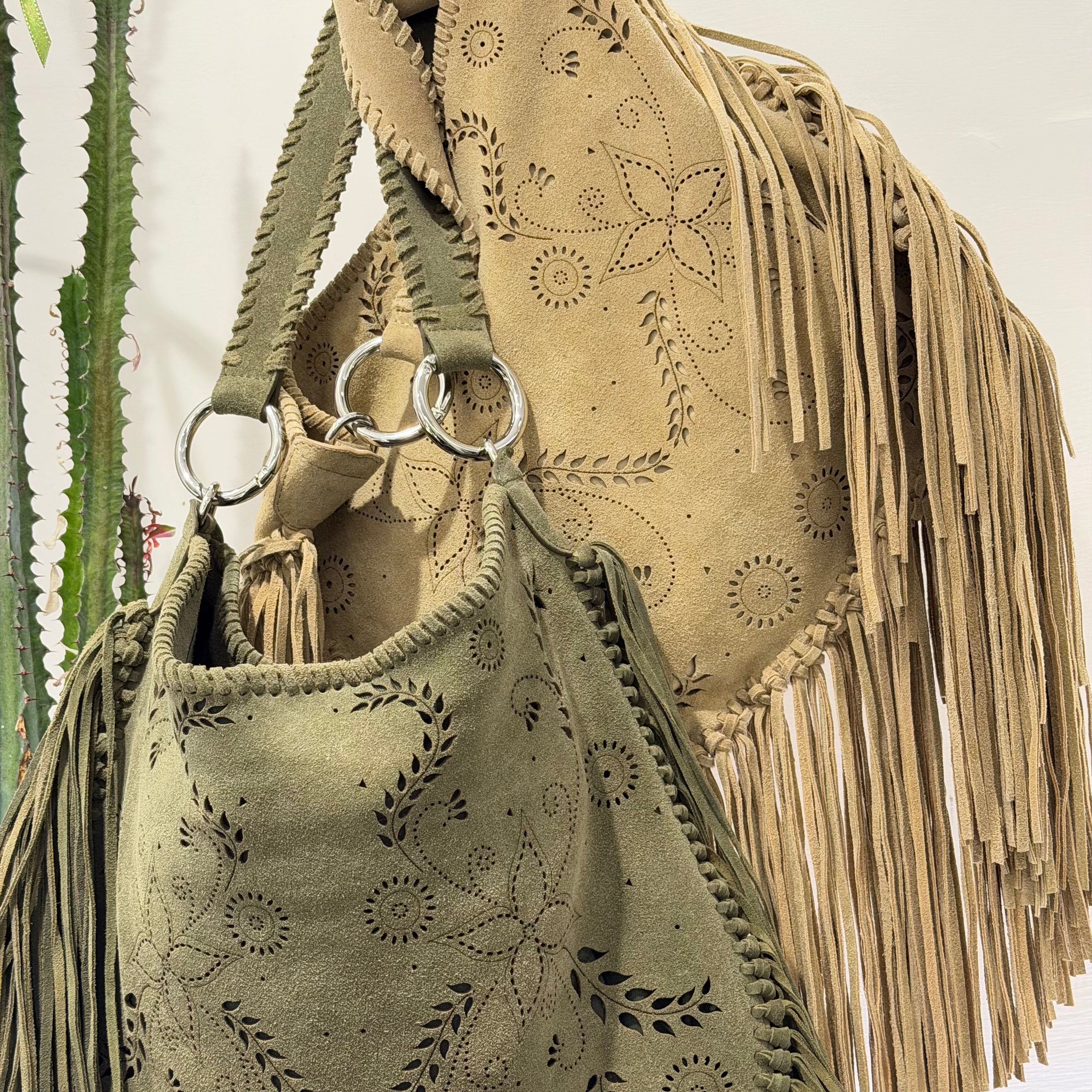 Elena Iachi borsa LASER frange