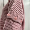 Maglione ROSA bottoni manica