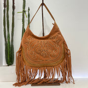 Elena Iachi borsa TEX frange