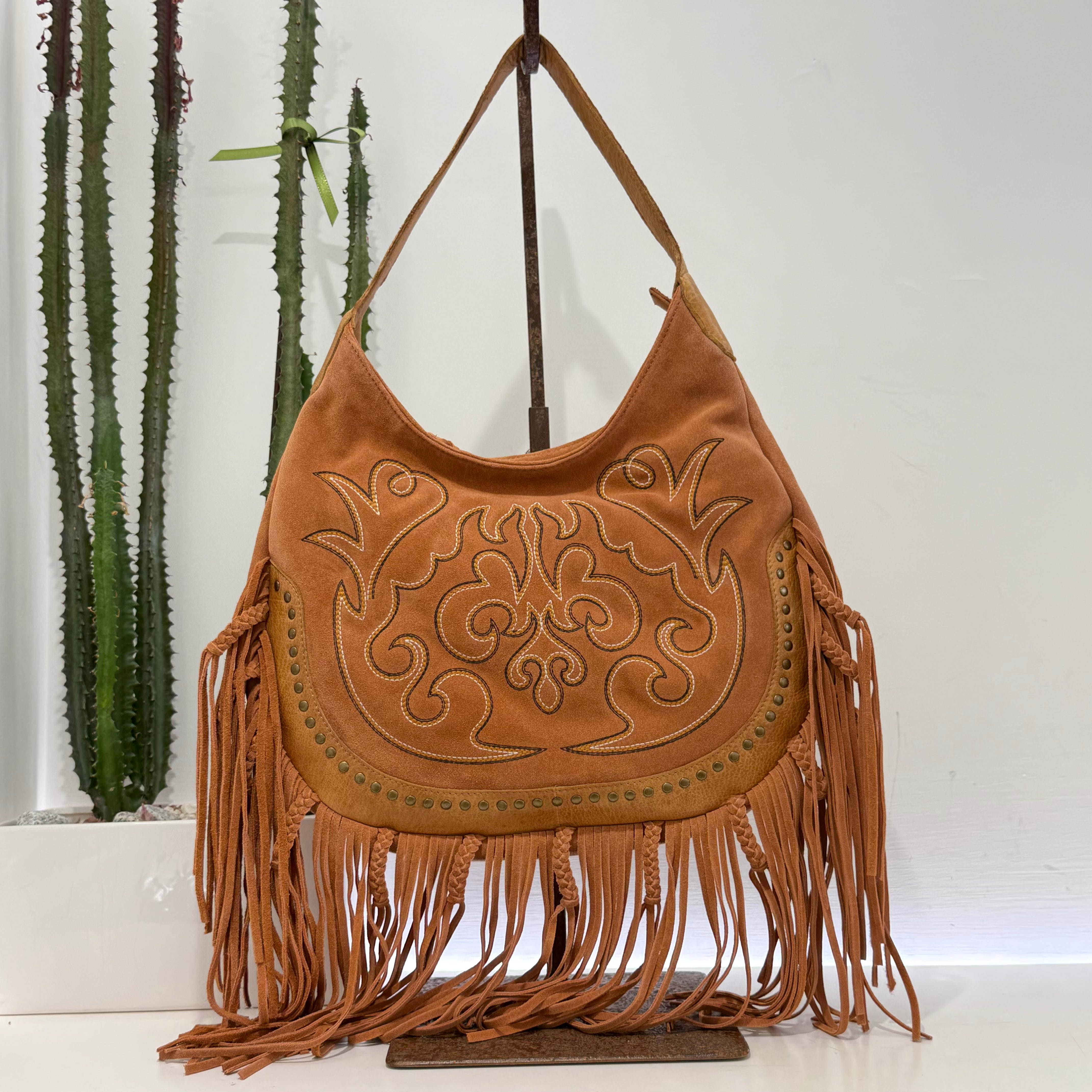 Elena Iachi borsa TEX frange