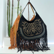 Elena Iachi borsa TEX frange