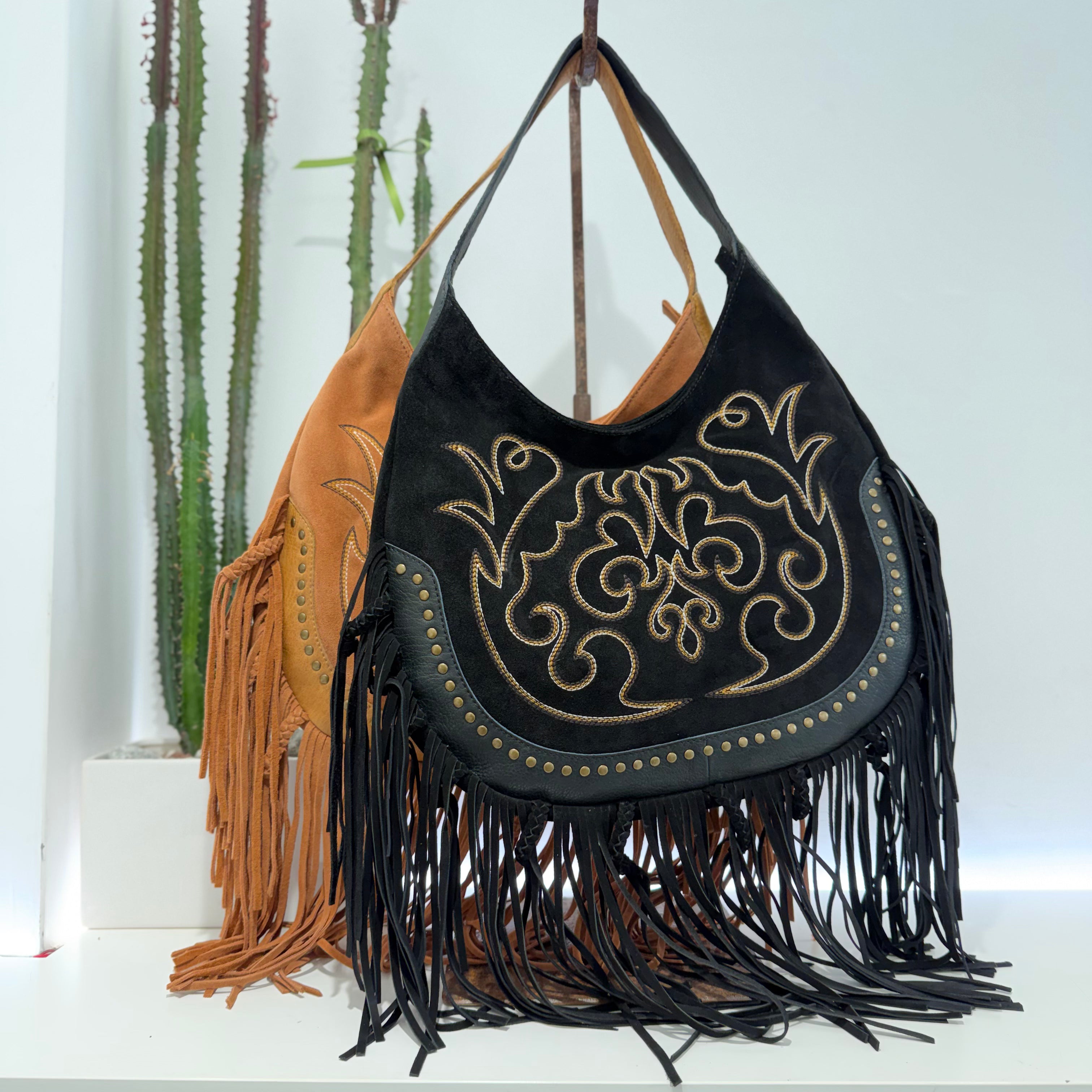 Elena Iachi borsa TEX frange