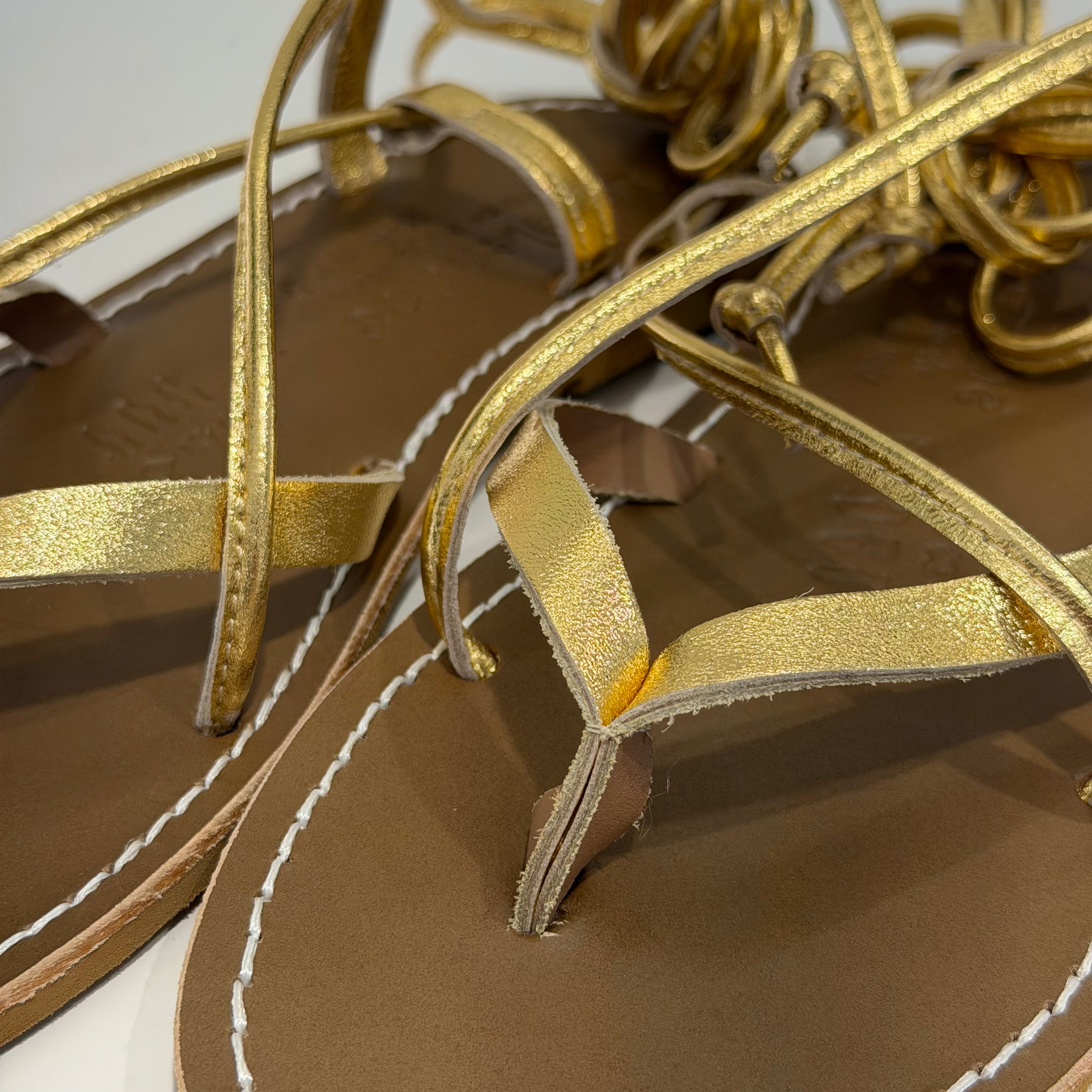 Le Salentine gold platinum flip flop sandal