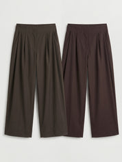 Pantalone con pieghe