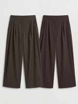Pantalone con pieghe