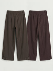 Pantalone con pieghe