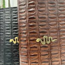 Alberto Luti pochette stampa cocco accessorio shake oro