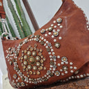 Campomaggi borsa linea TERESA borchie e rivetti argento e oro