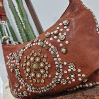 Campomaggi borsa linea TERESA borchie e rivetti argento e oro