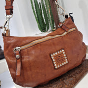 Campomaggi borsa linea TERESA borchie e rivetti argento e oro