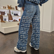 pantalone jeans traforato