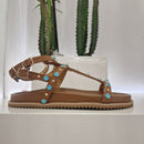 Sandalo modello gladiatore color cuoio accessorio turchese