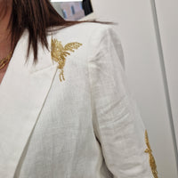 Giacca  color panna con paillettes oro