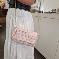 CHICA pochette intrecciata rosa chiaro