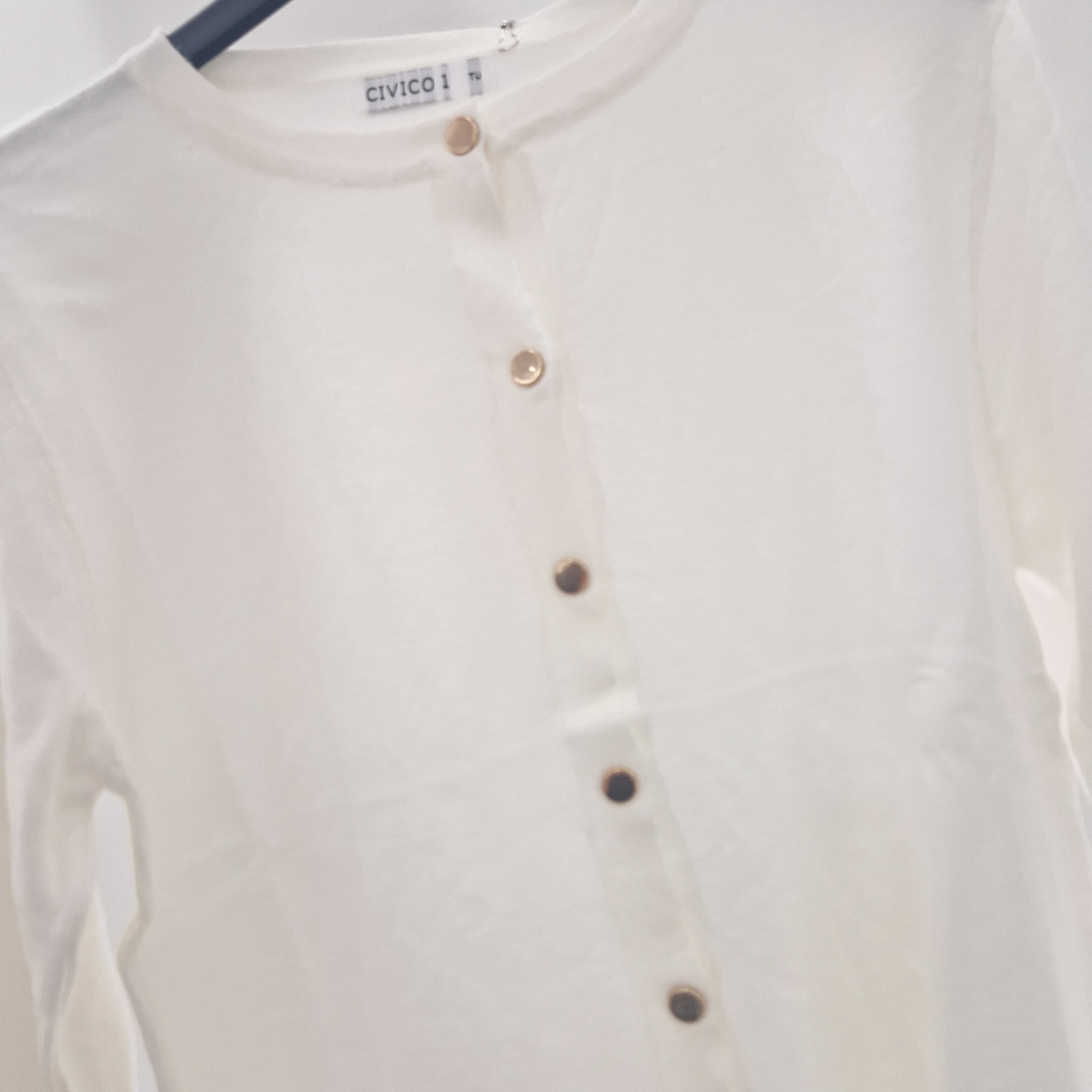 Maglia cardigan panna con bottoncini oro