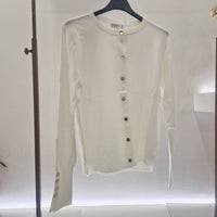 Maglia cardigan panna con bottoncini oro