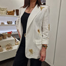 Giacca  color panna con paillettes oro
