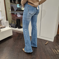 KIKISIX pantalone jeans CALIFORNIA a zampa